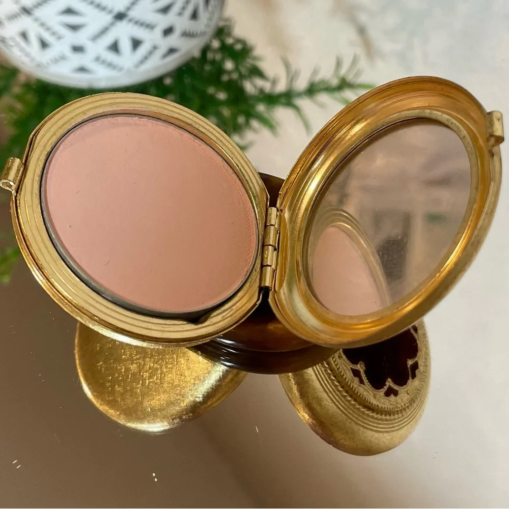 Vintage Revlon “Love Pat” Gold-tone Powder Compact with Burgundy Velvet Accent.